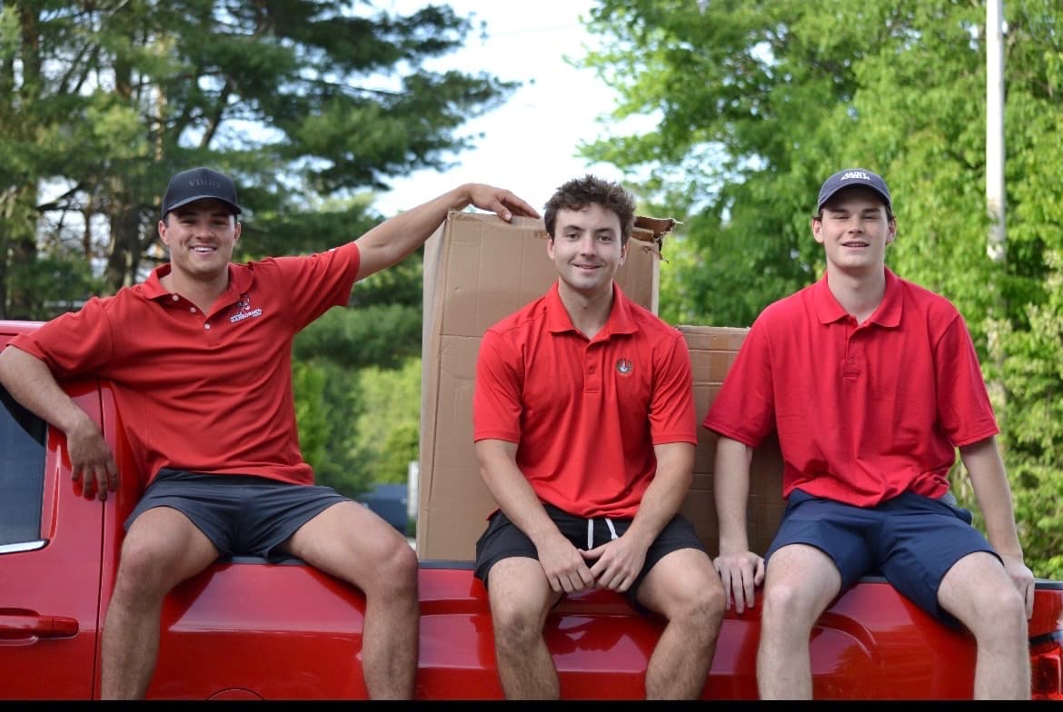 Andrew, Anthony, and Charles — the Big Red Moving Company team